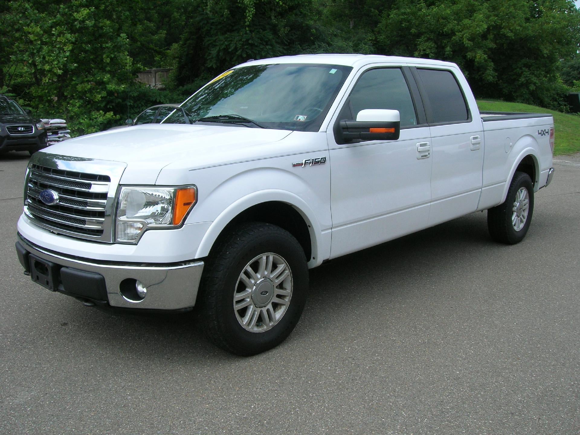 2014 Ford F-150 XL in White — front three-quarter view