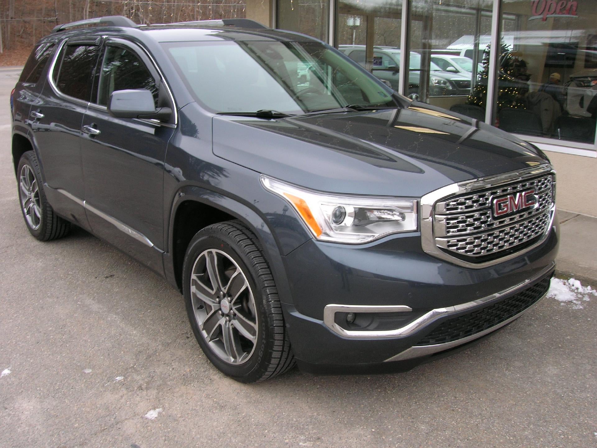 2019 GMC Acadia Denali in Dark Sky Metallic — front three-quarter view