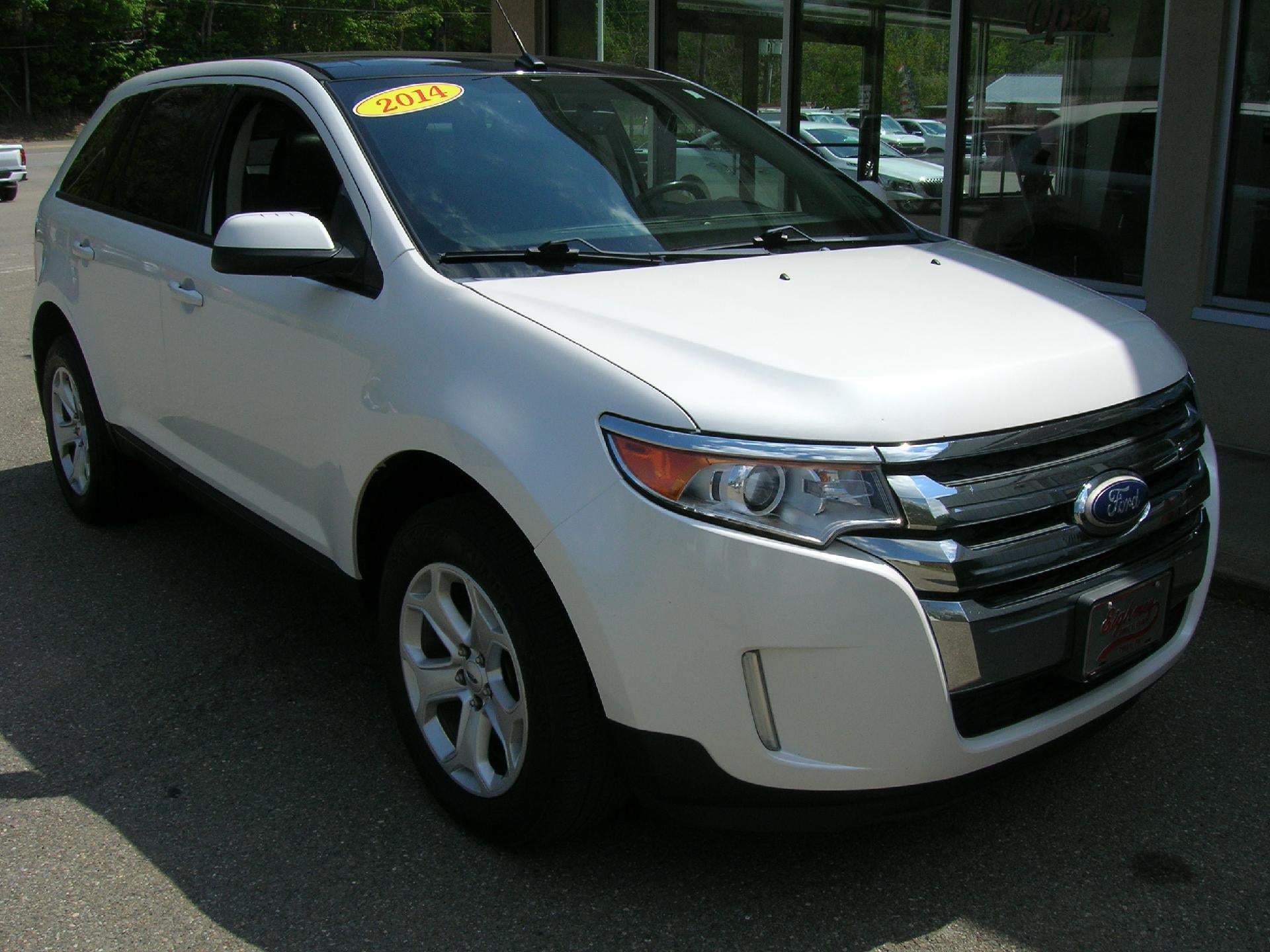 2014 Ford Edge SEL in White — front three-quarter view