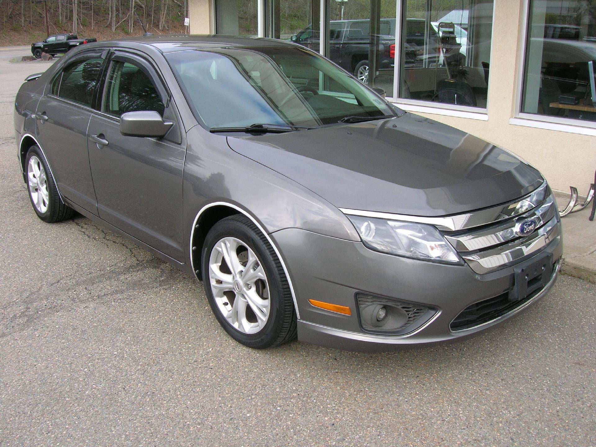2012 Ford Fusion SE in Red — front three-quarter view